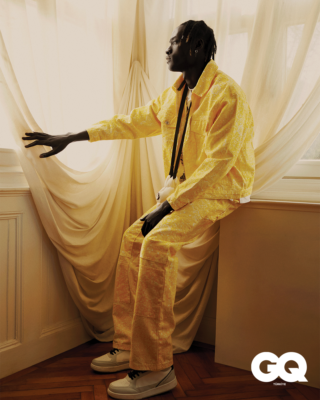 Anselme Nsango & Filip Gasievicz for GQ news photo